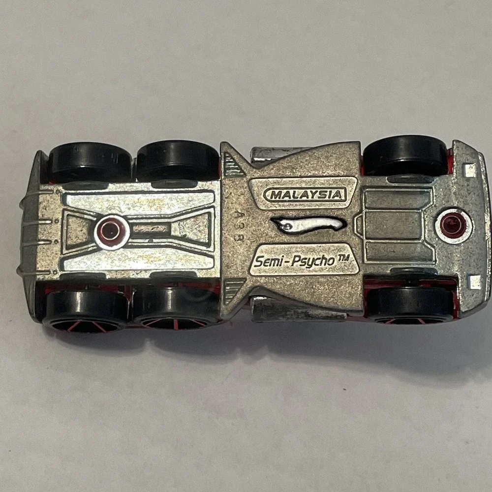 HOT‎ WHEELS 2012 CODE CARS #16/22 SEMI-PSYCHO RED Loose